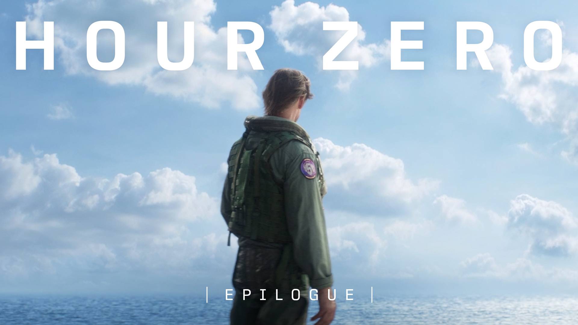 Hour Zero Ace Combat prequel epilogue cinematic showing a pilot in green flight jacket facing the sea under blue sky